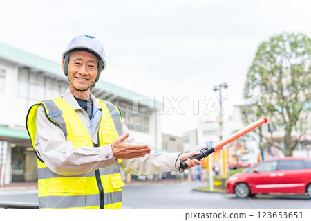 Traffic guidance worker Traffic guidance worker 123653651