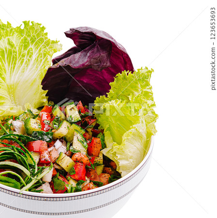 Colorful salad with fresh vegetables and herbs on a white background 123653693