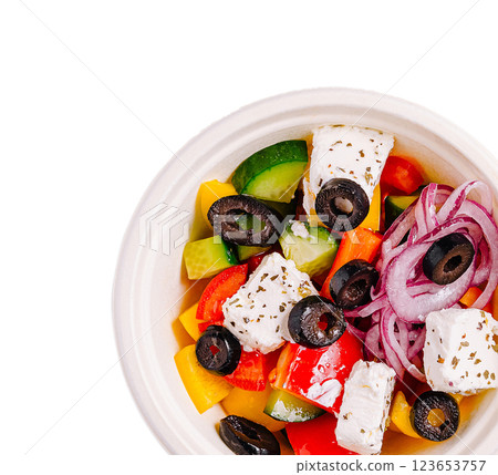 Fresh vegetable salad with olives and feta cheese served in bowl 123653757
