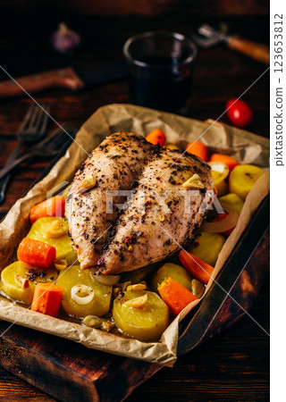 Seasoned chicken breast baked in oven 123653812