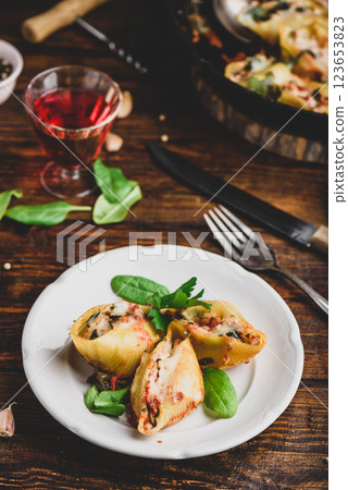 Pasta stuffed with ground beef, spinach and cheese Pasta stuffed with ground beef, spinach and cheese 123653823