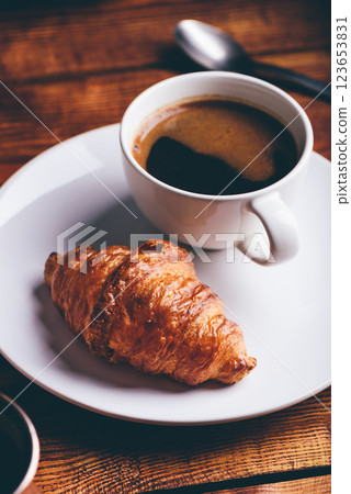 Cup of Coffee and Fresh Croissant 123653831