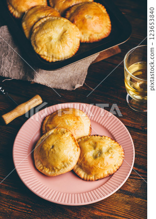Oven Baked Pastries Filled with Chives and Mushrooms Oven Baked Pastries Filled with Chives and Mushrooms 123653840