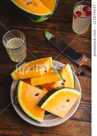 Sliced Yellow Watermelon Sliced Yellow Watermelon 123654247