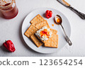 Crackers with Habanero Pepper Jam and Ricotta Cheese 123654254