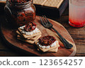 Crackers with homemade sundried tomato and cream cheese 123654257