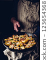 Skillet of pasta stuffed with ground beef, spinach and cheese 123654368