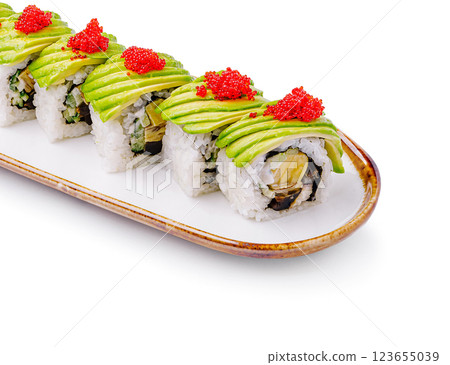 Delicious sushi rolls with avocado and fish roe on a platter 123655039
