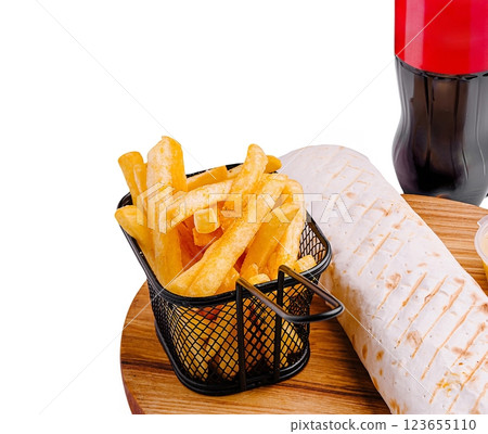 Delicious fries and wrap served with a refreshing drink 123655110