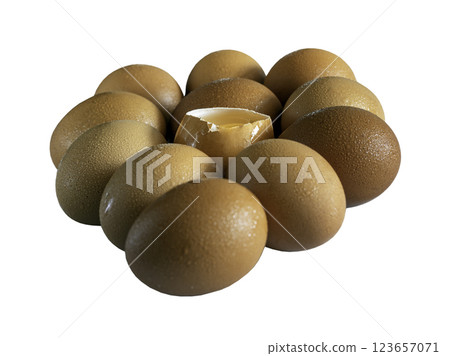 Egg yolk in Broken raw chicken eggshell in the among of Fresh chicken egg isolated on White background with clipping path. 123657071