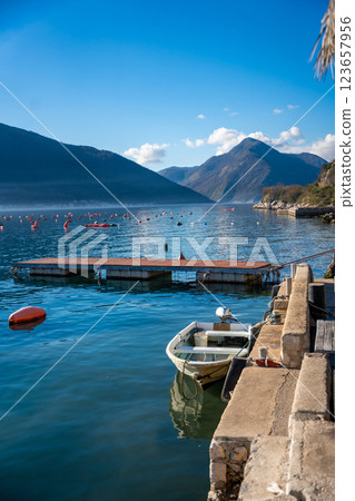 Panoramic view of Kotor Bay with oyster farms in winter morning, Montenegro Panoramic view of Kotor Bay with oyster farms in winter morning, Montenegro 123657956