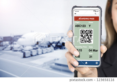 Businesswoman holding smartphone showing e-boarding on screen. 123658118