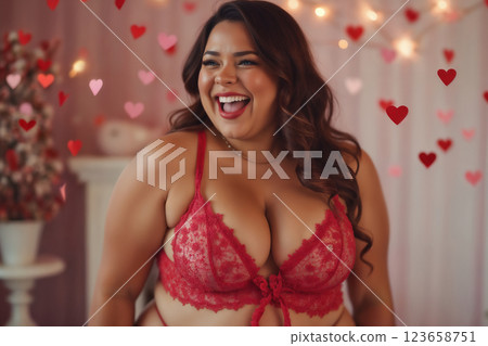 portrait of a beautiful woman in lingerie on a body with hearts bokeh 123658751