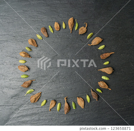 Black Cardamom Seeds Isolated, Brown Cardamon, Dry Kardamon Fruits, Cardamum Spice, Cardamomum Black Cardamom Seeds Isolated, Brown Cardamon, Dry Kardamon Fruits, Cardamum Spice, Cardamomum 123658871