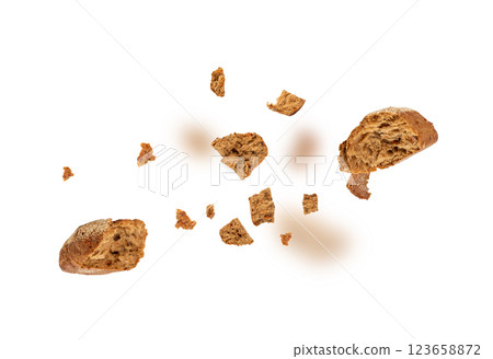 Broken wheat brown bread pieces isolated, fitness pumpkin carrot buns with seeds, cereal bread 123658872