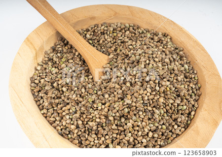 Hemp seeds, cannabis grains, marijuana kernels, oil hempseeds pile 123658903
