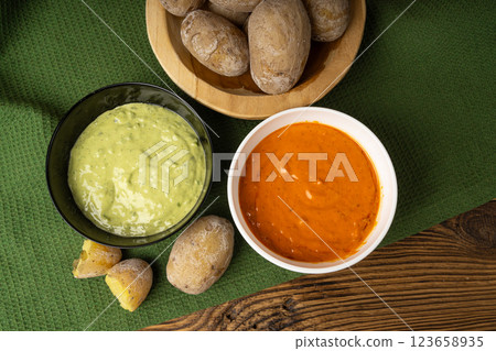 Red mojo rojo and green mojo verde sauces, traditional Tenerife dips, mojo picon dressing Red mojo rojo and green mojo verde sauces, traditional Tenerife dips, mojo picon dressing 123658935