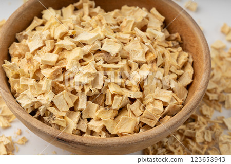 Dry parsley root, dried diced celery cubes, scattered small liquorice pileces, dry vegetable Dry parsley root, dried diced celery cubes, scattered small liquorice pileces, dry vegetable 123658943