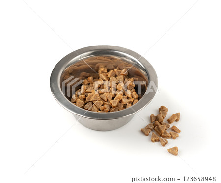 Mini pet food shaped like hearts isolated, small dogs crunchy treats pile, flavored brown dry kibble Mini pet food shaped like hearts isolated, small dogs crunchy treats pile, flavored brown dry kibble 123658948