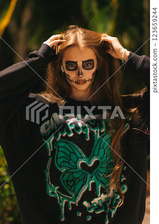Portrait of creepy teenage girl with Halloween makeup Portrait of creepy teenage girl with Halloween makeup 123659244
