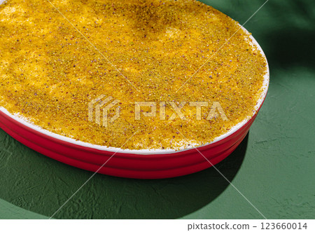 Popular dessert featuring layers of cream on a colorful plate Popular dessert featuring layers of cream on a colorful plate 123660014