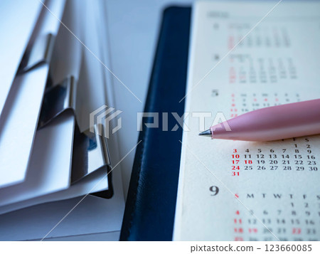 Calendar and documents on the table Calendar and documents on the table 123660085