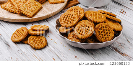 Cookies and biscuits arranged beautifully on a wooden table Cookies and biscuits arranged beautifully on a wooden table 123660133