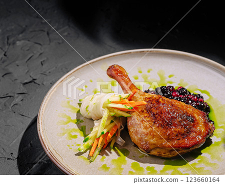 Elegant duck with berry sauce and fresh veggies Elegant duck with berry sauce and fresh veggies 123660164