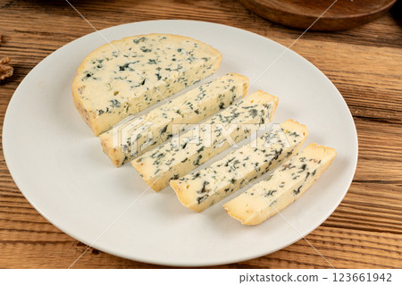 Fourme cheese, stinky french cheese, Fourme d'Ambert gourmet food, semi-hard blue cheese Fourme cheese, stinky french cheese, Fourme d'Ambert gourmet food, semi-hard blue cheese 123661942