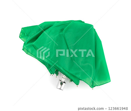 Compact folded umbrella isolated, small green parasol, old umbrella Compact folded umbrella isolated, small green parasol, old umbrella 123661948