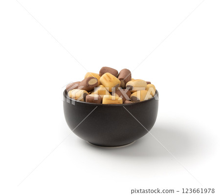 Filled dog biscuits, crackers isolated, soft crunchy pet treats pile, flavored small canine cookie Filled dog biscuits, crackers isolated, soft crunchy pet treats pile, flavored small canine cookie 123661978