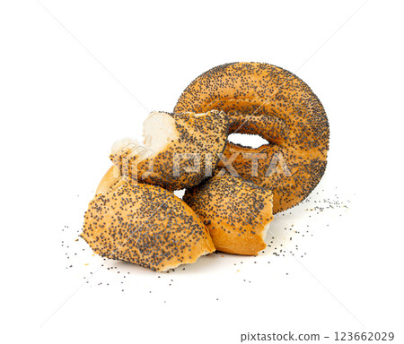 Broken Poppy Seed Bagel Isolated, Round Bread Bun, Poppyseed Wheat Bakery Pieces for Breakfast 123662029
