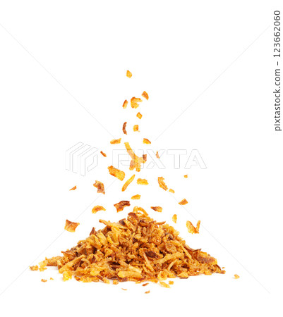 Falling Roasted Onion Isolated, Flying Dry Onion Pieces, Bulb Chips, Deep Fried Vegetable 123662060