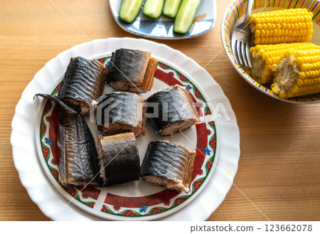 Smoked eel pieces on plate, barbecue seafood, grilled fish dinner, gourmet delicious fatty fish 123662078
