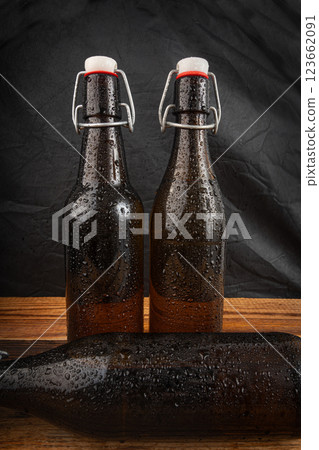 Old beer bottle, brown glass vintage beerbottle, a quality traditional time-tested drink symbol 123662091