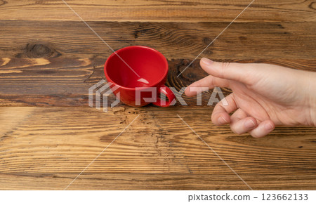 Hand Holds Cup, Empty Red Cup in Hands, Coffee Mug, Teacup, Hot Beverage Mockup Hand Holds Cup, Empty Red Cup in Hands, Coffee Mug, Teacup, Hot Beverage Mockup 123662133