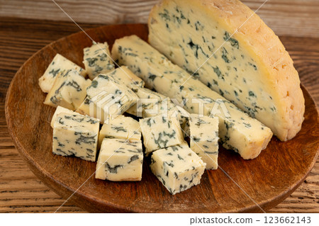 Fourme cheese, stinky french cheese, Fourme d'Ambert gourmet food, semi-hard blue cheese Fourme cheese, stinky french cheese, Fourme d'Ambert gourmet food, semi-hard blue cheese 123662143