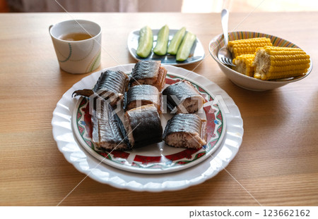 Smoked eel pieces on plate, barbecue seafood, grilled fish dinner, gourmet delicious fatty fish 123662162