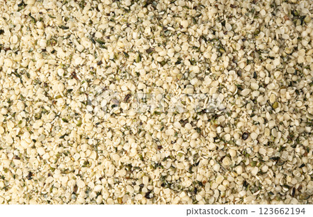 Shelled hemp seeds pile, peeled cannabis grains, marijuana kernels without peel 123662194