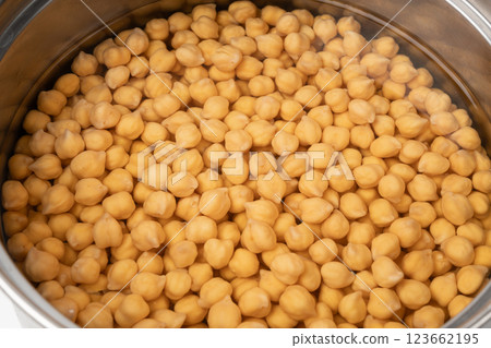 Soaked chickpeas, chick pea in water, swollen wet Cicer arietinum fruits, garbanzo beans cooking 123662195