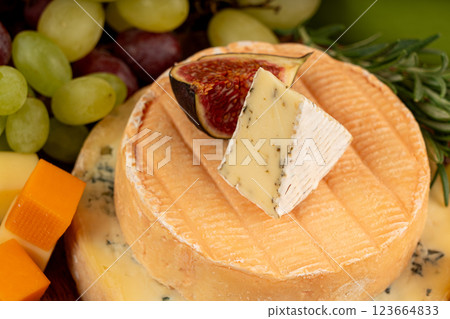 Cheese plate of color cheeses variety, yellow, white and blue cheese board, assorted dairy products 123664833