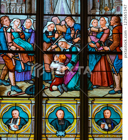 Stained glasses of the cathedral, Josselin, France Stained glasses of the cathedral, Josselin, France 123665347