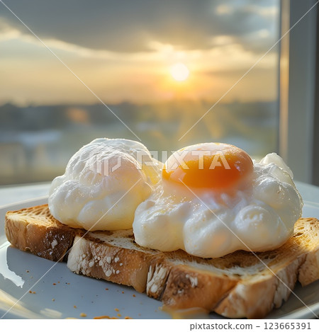 Sunlit Cloud Eggs: Fluffy Whites and Golden Yolk on Toast 123665391