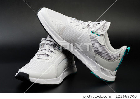 Pair of white casual shoes Pair of white casual shoes 123665706