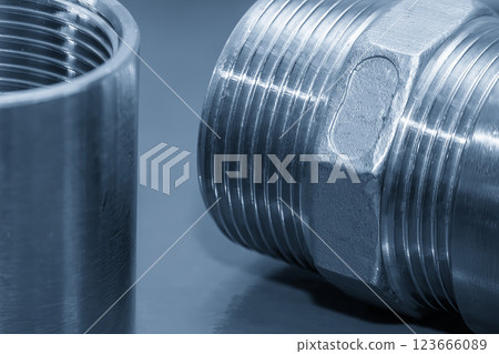 Close up scene the stainless pipe connector in the light blue scene. 123666089