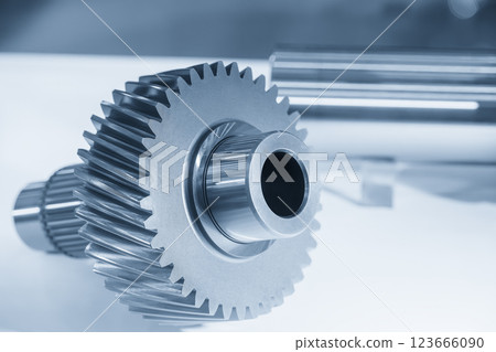 Close up the transmission gear spare parts in the light blue scene. Close up the transmission gear spare parts in the light blue scene. 123666090