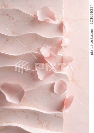 Delicate rose petals cascade over a smooth marble surface, enhanced by soft-focus pastel lighting to create a serene atmosphere. This luxurious design offers ample space for text 123666334