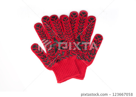 Red protective gloves with black rubber grip patterns on a white background. Ideal for construction, gardening Red protective gloves with black rubber grip patterns on a white background. Ideal for construction, gardening 123667058