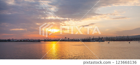 A stunning Varna harbor landscape during sunset features warm hues A stunning Varna harbor landscape during sunset features warm hues 123668136
