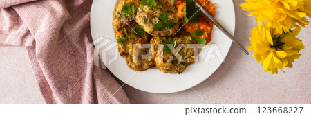 Start your morning with a healthy, savory meal of zucchini pancakes paired with vibrant tomato and bell pepper caviar, packed with fresh vegetables and nutrients, banner Start your morning with a healthy, savory meal of zucchini pancakes paired with vibrant tomato and bell pepper caviar, packed with fresh vegetables and nutrients, banner 123668227